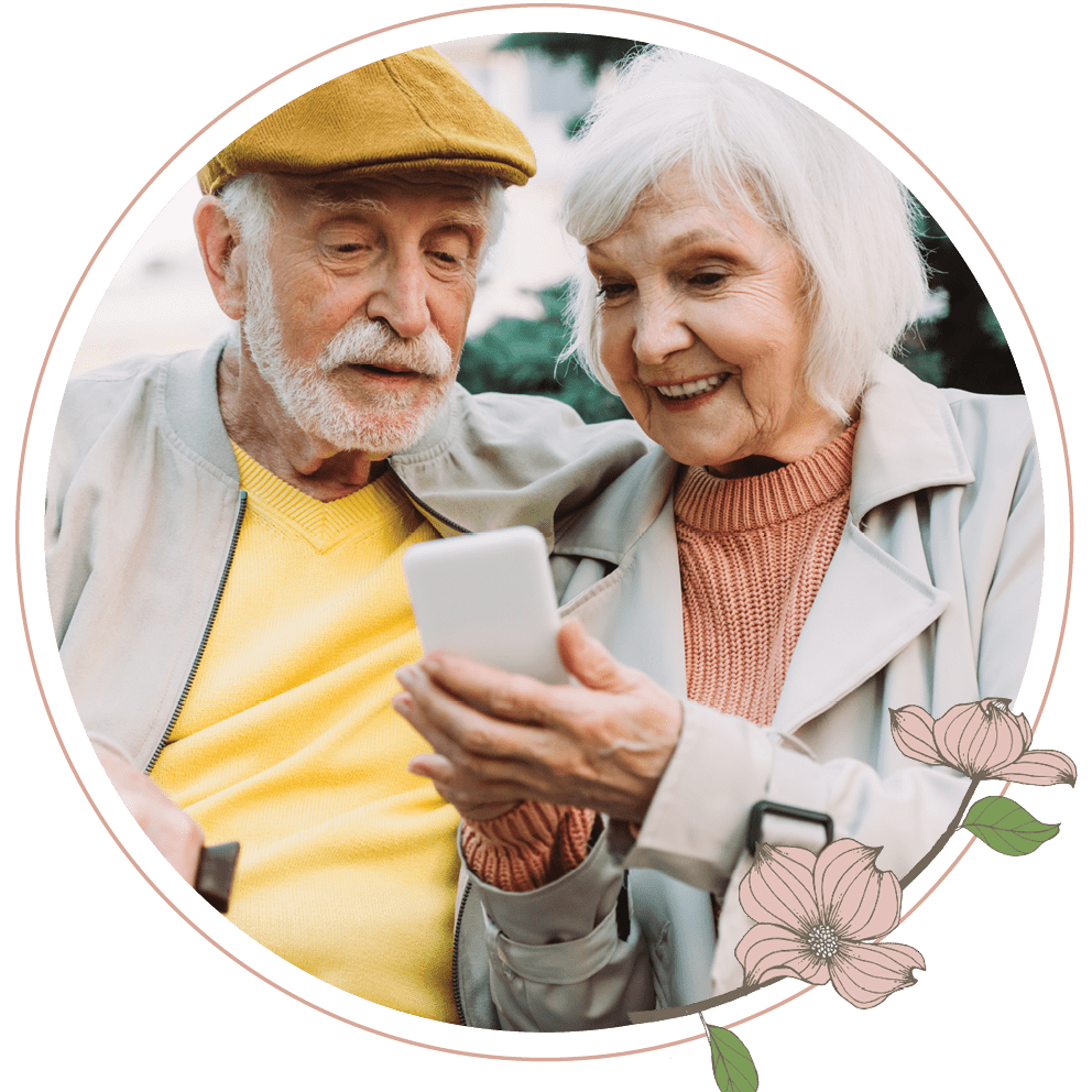 Heisinger Bluffs Senior Living Community is ideally located in the heart of Jefferson City, MO, and our commitment to enriching senior lives extends beyond the walls of our campus. We proudly cover Jefferson City and its surrounding areas, offering residents an array of nearby amenities and attractions to enhance their daily lives: An elderly couple looking at a cell phone together