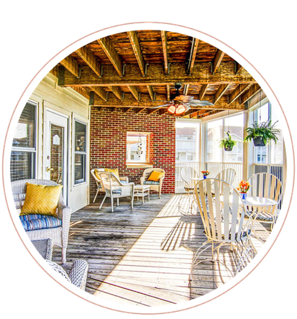 A porch with furniture