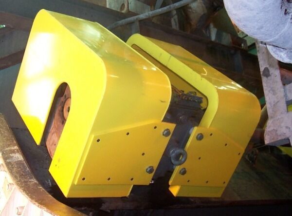 A yellow object is sitting on a conveyor belt - Engineering Tooling In Thornton, NSW