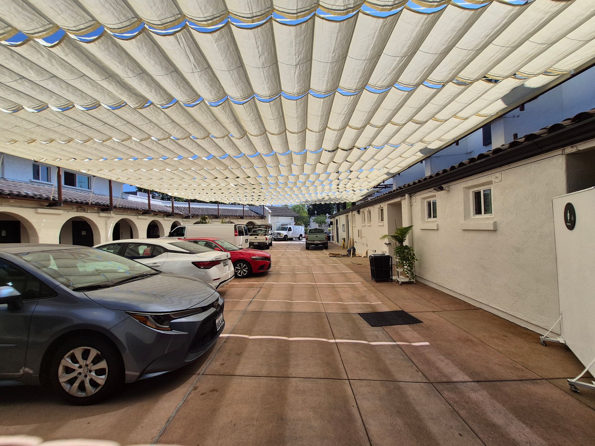Slide on wire awning panels for patio/parking area