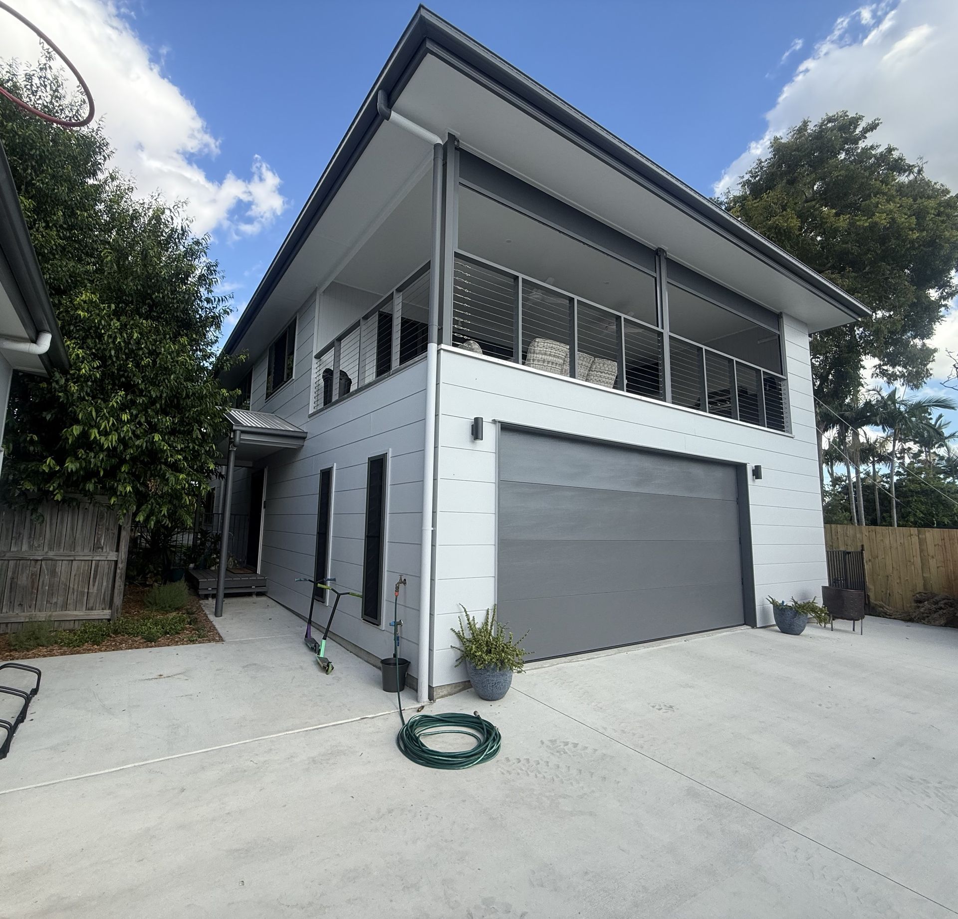 A Set of Stairs Leading Up to the Second Floor of a House โ Werry Building Services in Boyne Island, QLD