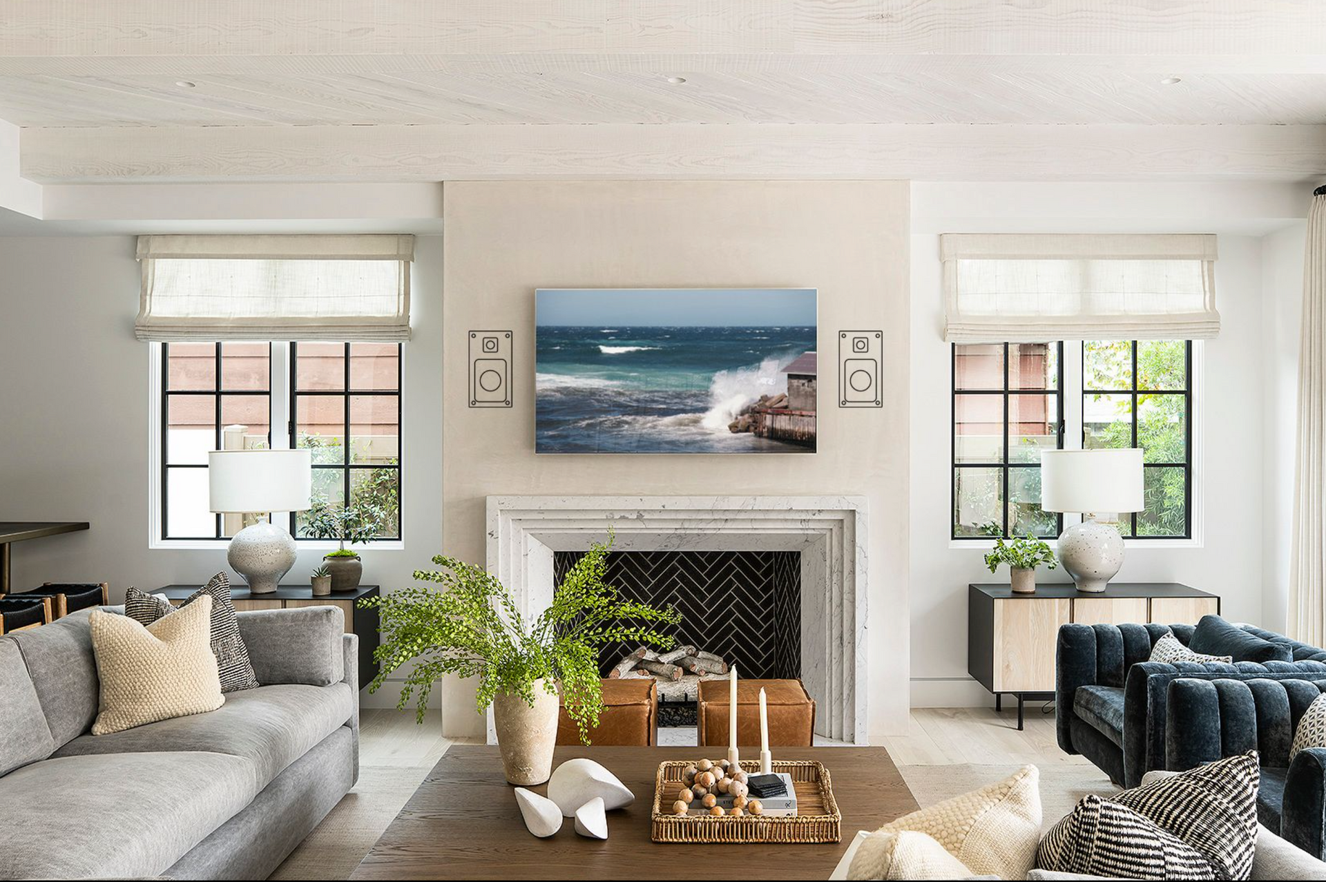 a living room with a fireplace , couch , chairs and a painting on the wall .