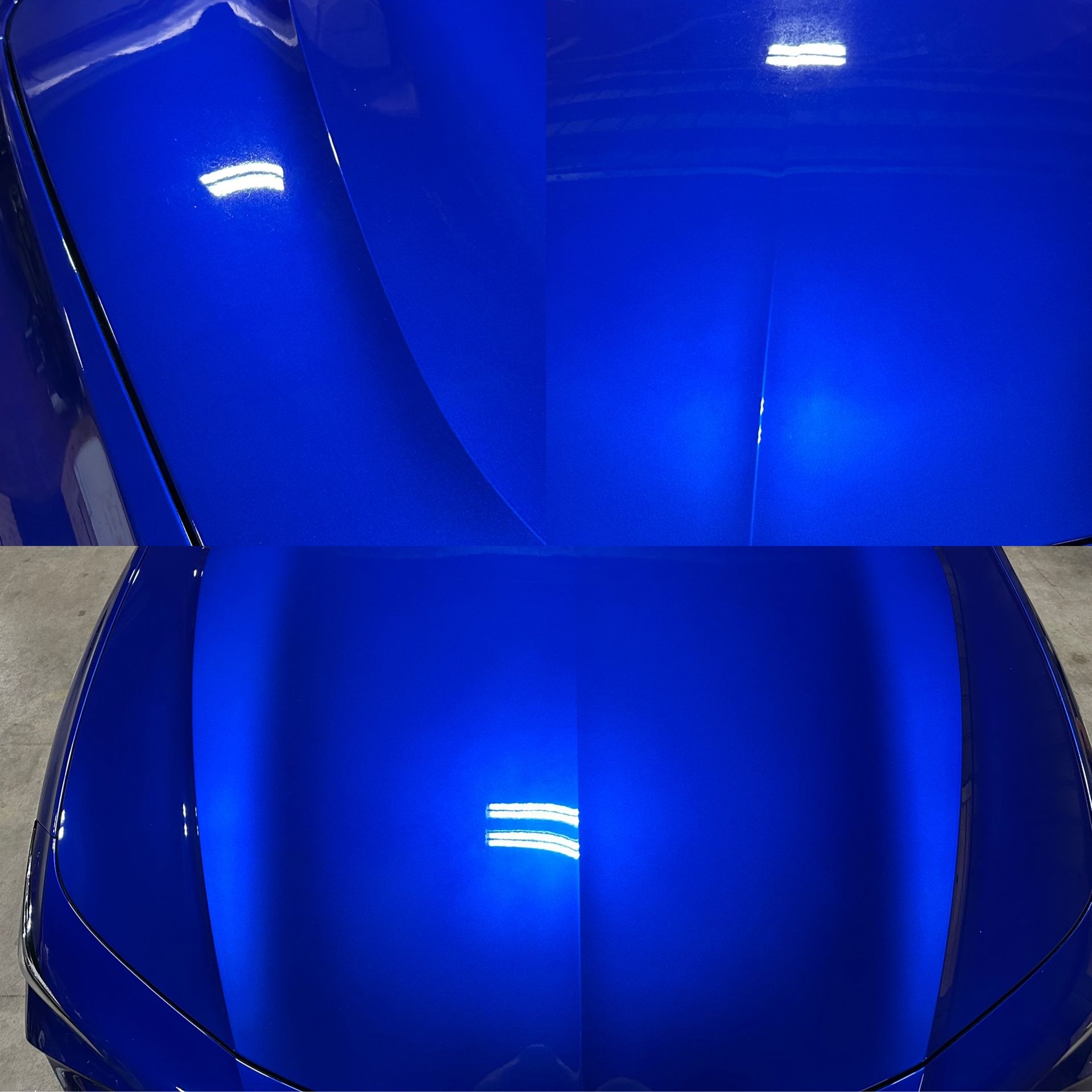 Close-up of a glossy blue curved surface with bright reflections and a central seam