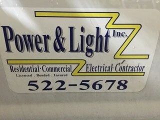 Power & Light Inc. electrical contractor sign with phone number 522-5678