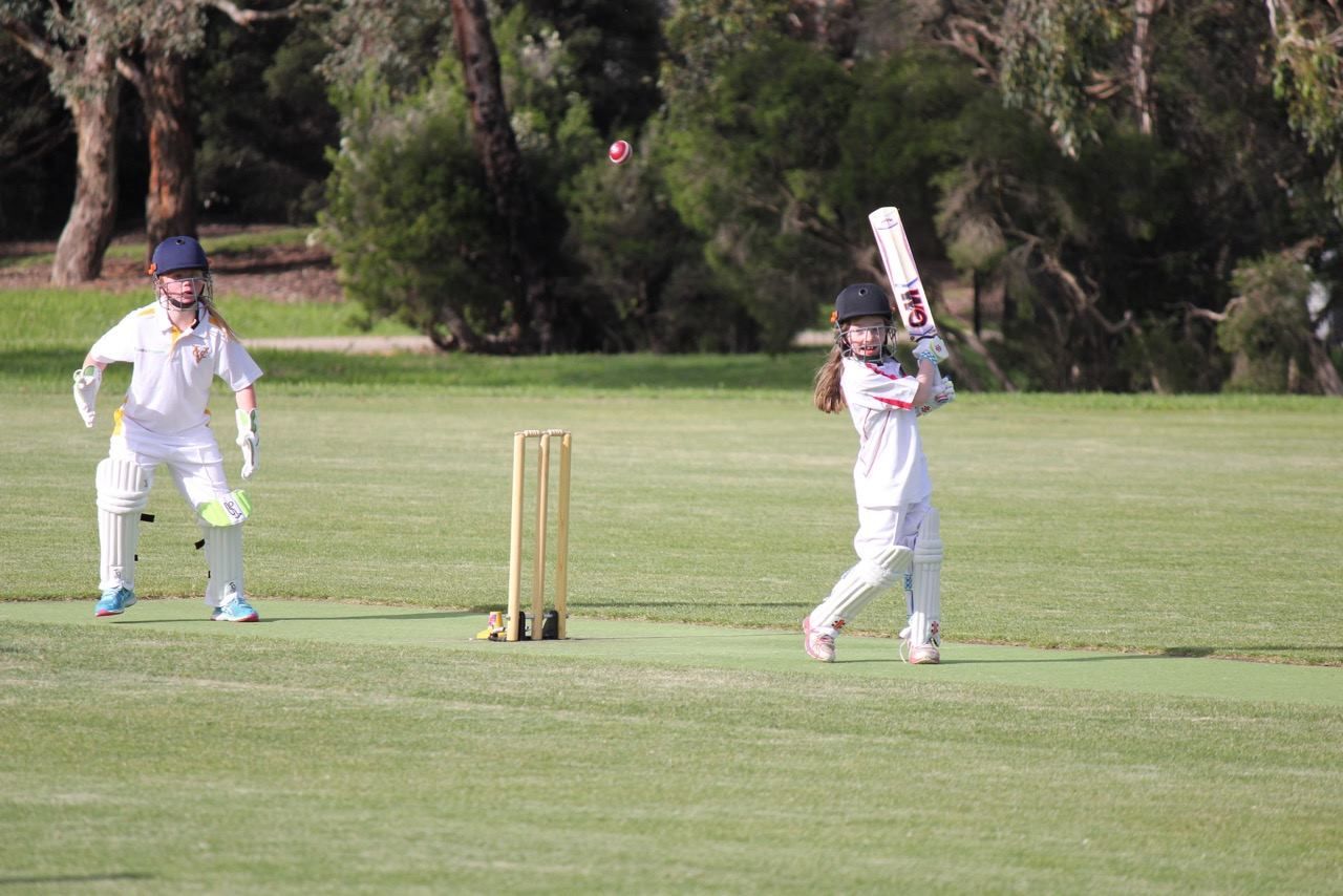 A BCC junior girl plays a cover drive at Kalang Park.