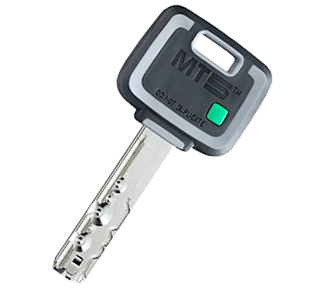 A close up of a mts key on a white background
