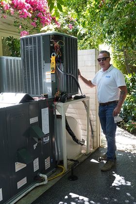 All Seasons Team Member with A/C Unit