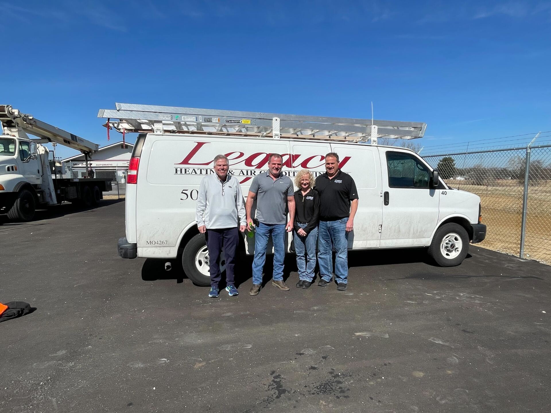 Bruce with Legacy Company in front of company van
