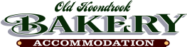 Old Koondrook Bakery logo with green lettering, gray shadow, and