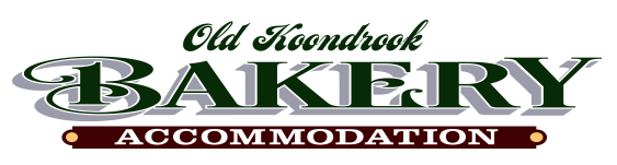 Logo for Old Kookbrook Bakery Accommodation with dark green text and a brown background.