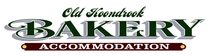 Logo for Old Kookbrook Bakery Accommodation with dark green text and a brown background.