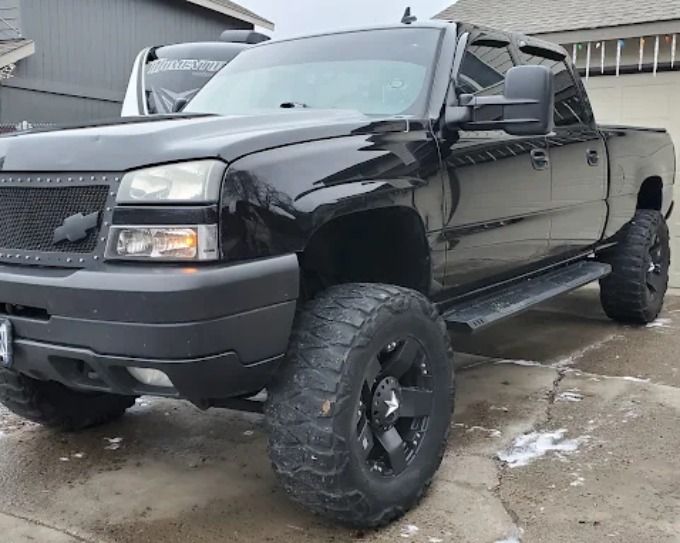 Black Chevrolet Silverado getting ceramic coating wash prep in Redmond, Oregon