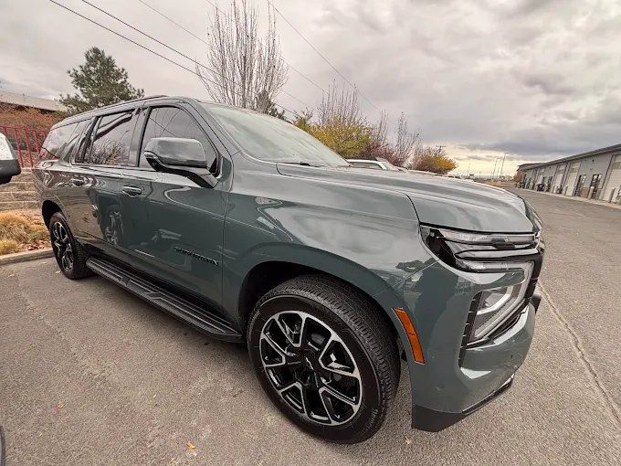 Gray Chevrolet Suburban SUV guarded against the elements with ceramic coating in Redmond, OR