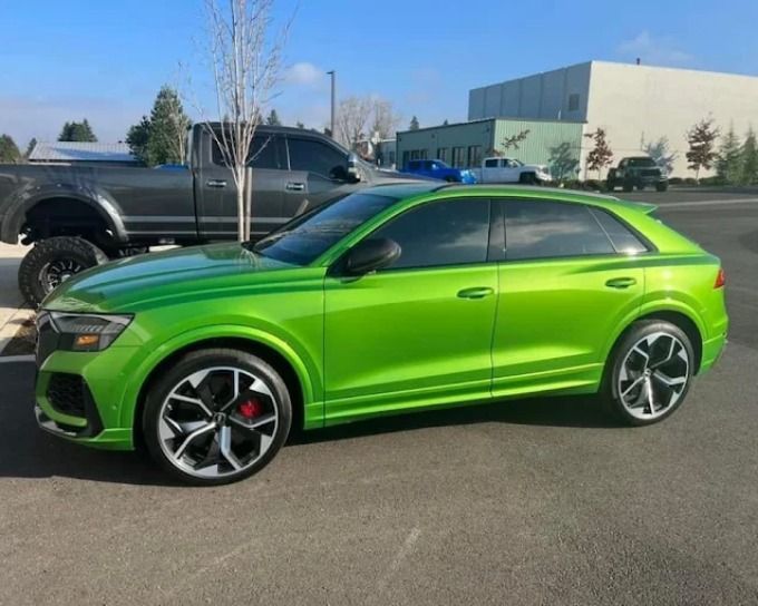 Glossy green Audi RS Q8 SUV after ceramic coating at Perfection Plus Auto Salon in Redmond, OR