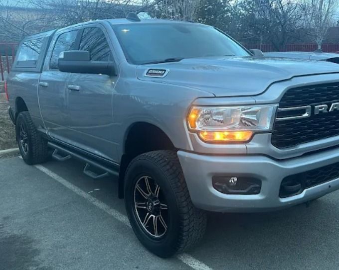 Silver Ram 2500 pickup with a slick, reflective finish from ceramic coating in Redmond, OR