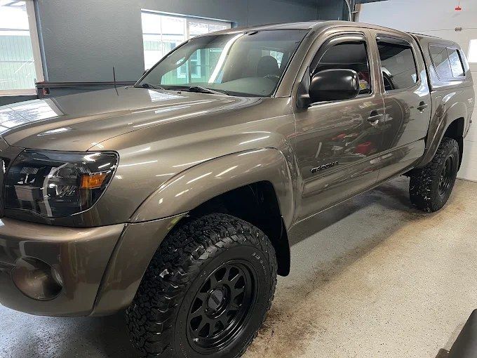 Tan Toyota Tacoma off-road truck guarded against rock chips with PPF in Redmond, OR