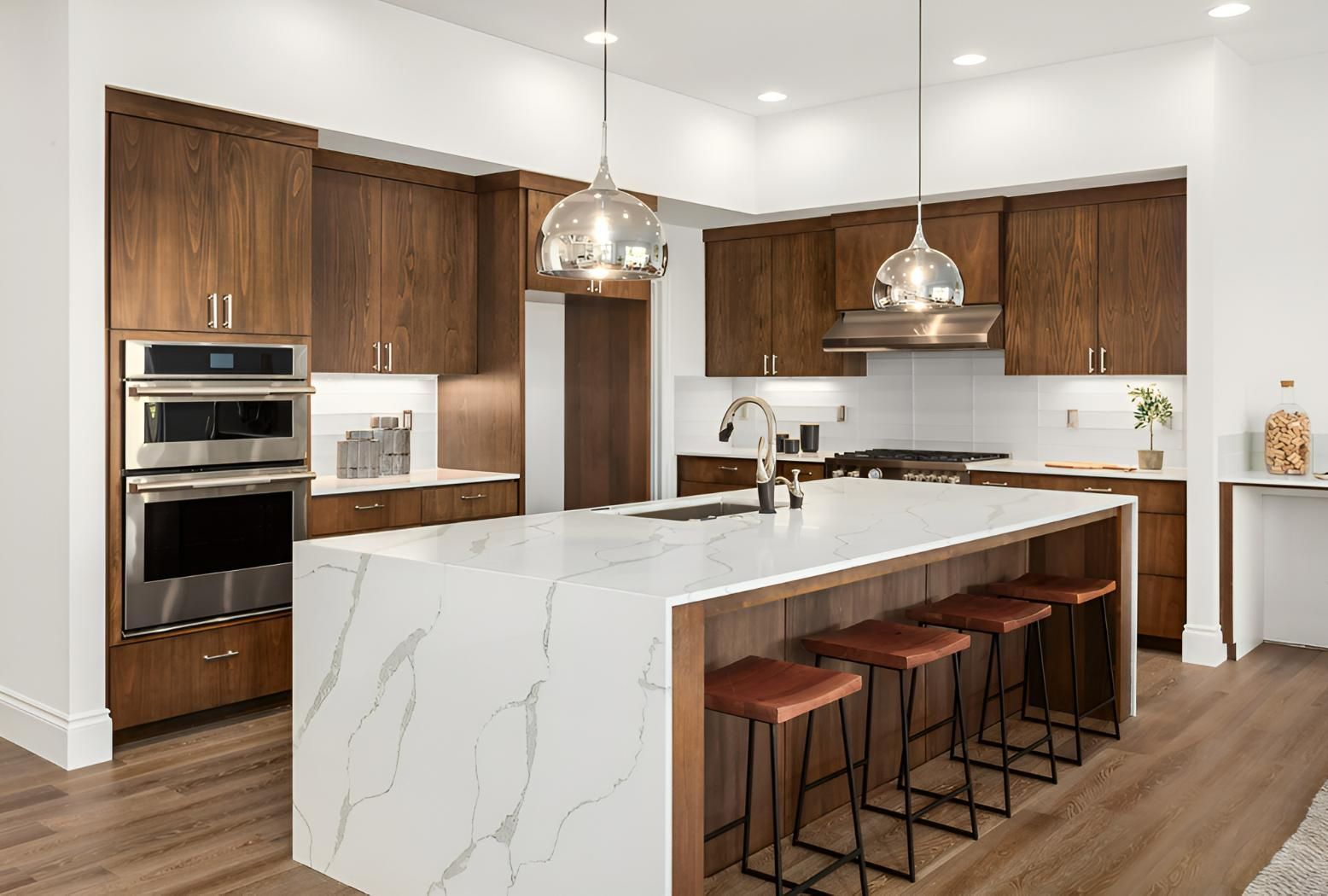 A Kitchen With Wooden Cabinets, Stainless Steel Appliances — Precision Kitchens & Cabinets in Ballina, NSW