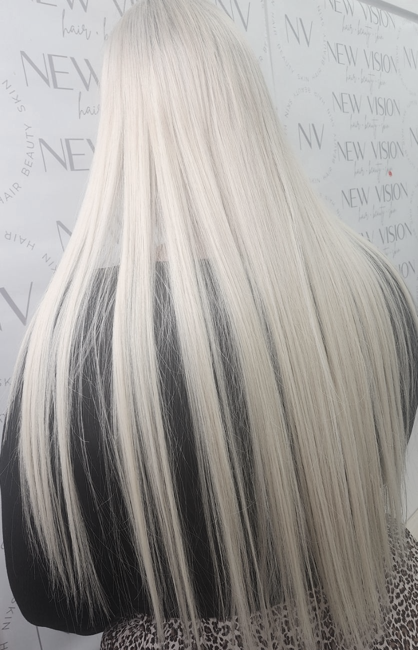 A bunch of hair extensions are sitting on a table