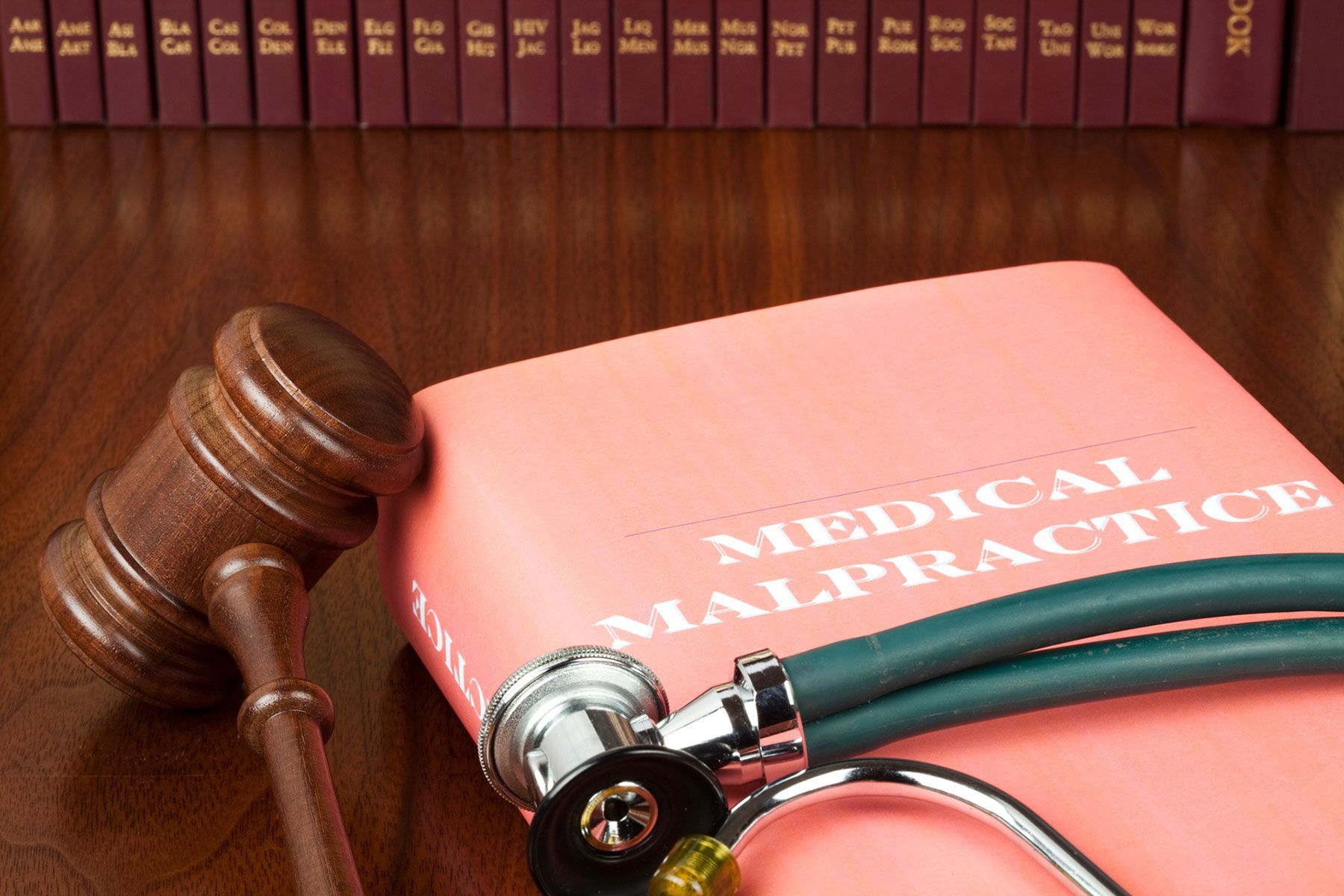 Stethoscope and Judge's Gavel on Medical Malpractice Book — Newport Beach, CA — Paoli & Purdy, PC