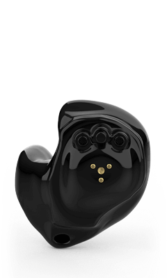 Black in-ear hearing aid, glossy finish, with three circular holes and three gold-colored dots.