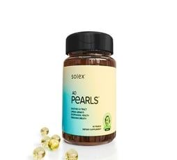 Bottle of Solex AD Pearls dietary supplement with yellow capsules.