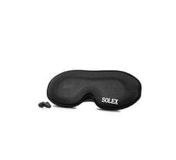 Black sleep mask with earplugs next to it; the mask has