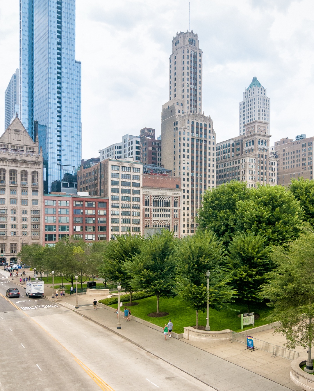 A city with a lot of tall buildings and trees