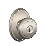 Brushed nickel round door knob with keyhole and circular backplate
