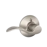 Brushed nickel lever door handle on a round backplate