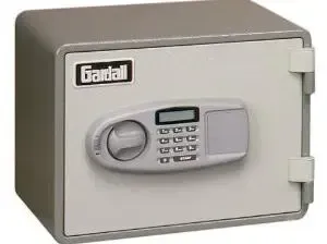 Gray steel safe with keypad lock and handle on the door.
