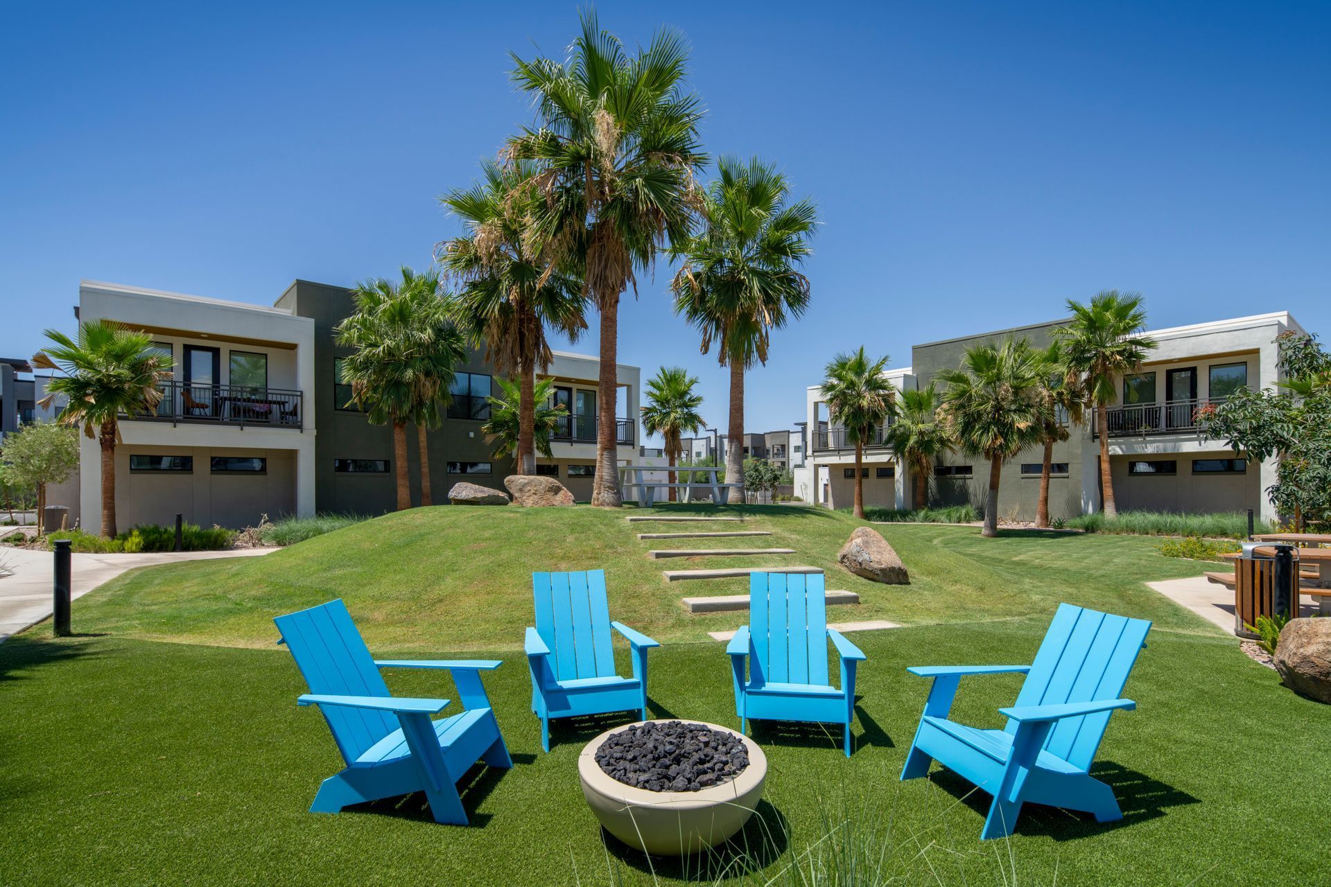 Blue lounge chair on the lawn at Livano Avondale.
