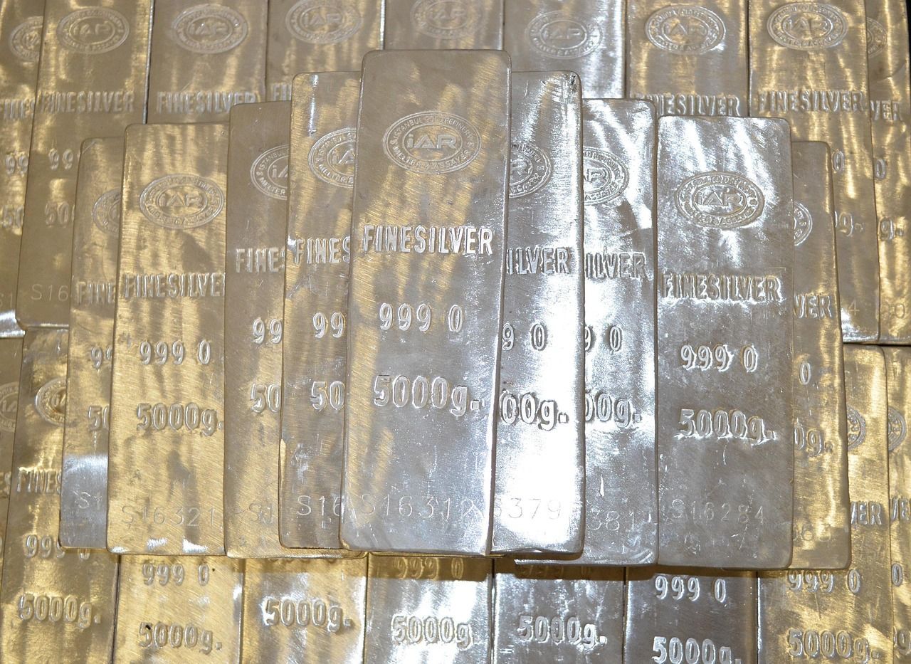 Silver bullion bars stacked, stamped with 
