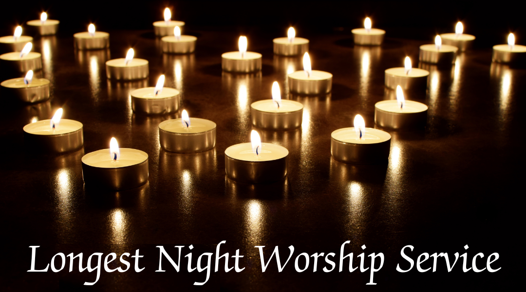 Row of lit candles on a dark surface with text: “Longest Night Worship Service”
