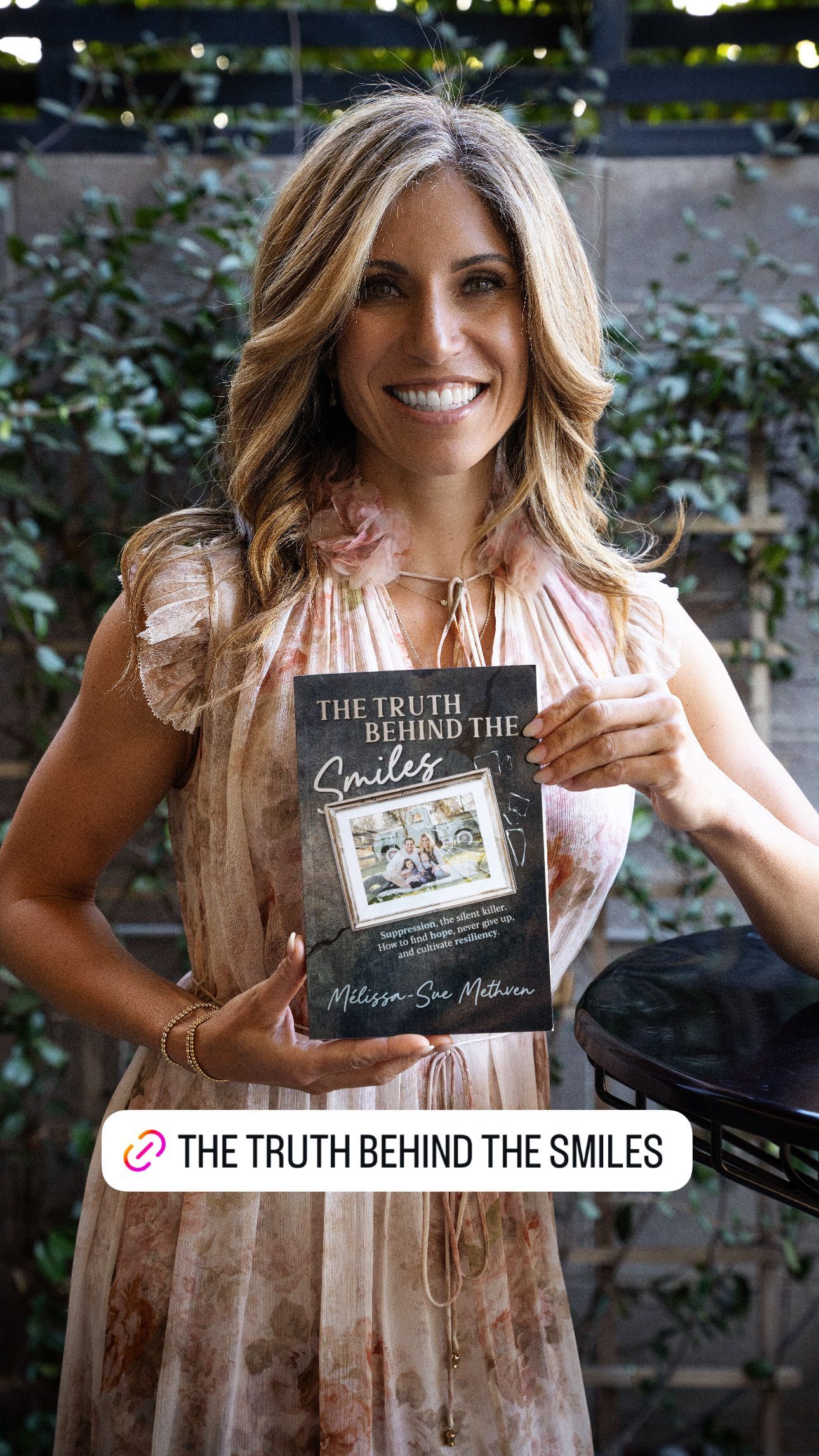 Woman holding a book titled