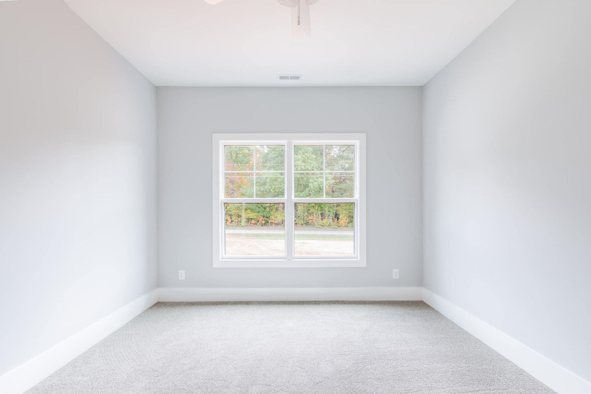 There is a large window in the middle of the room.
