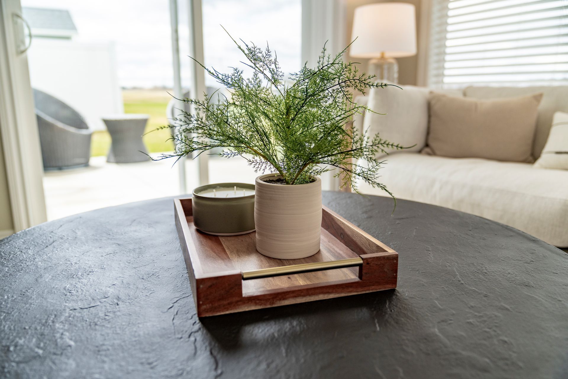 Photo of a decorative arrangement on top of a coffee table