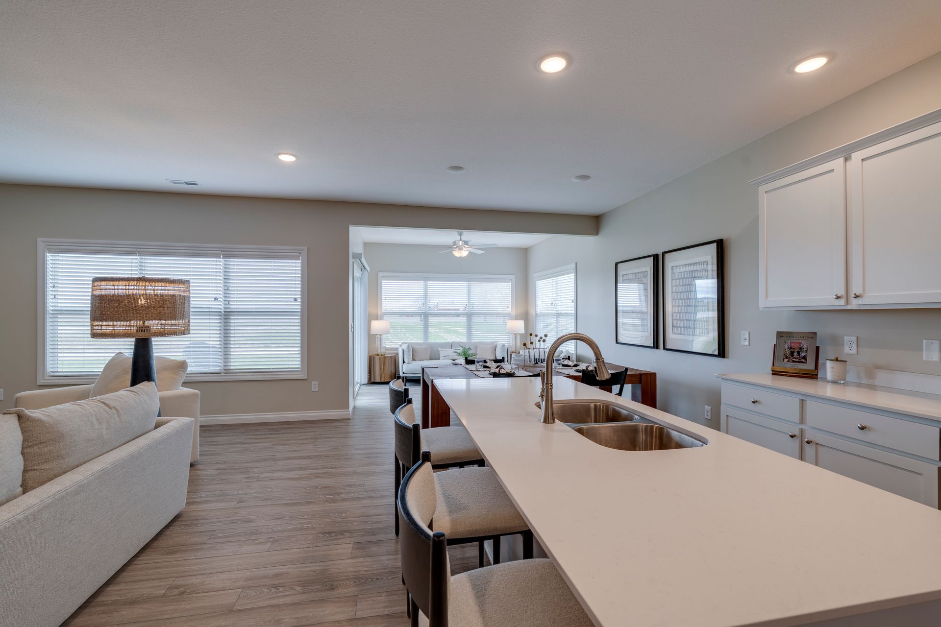 Photo of the kitchen, showing the wide width of the kitchen island