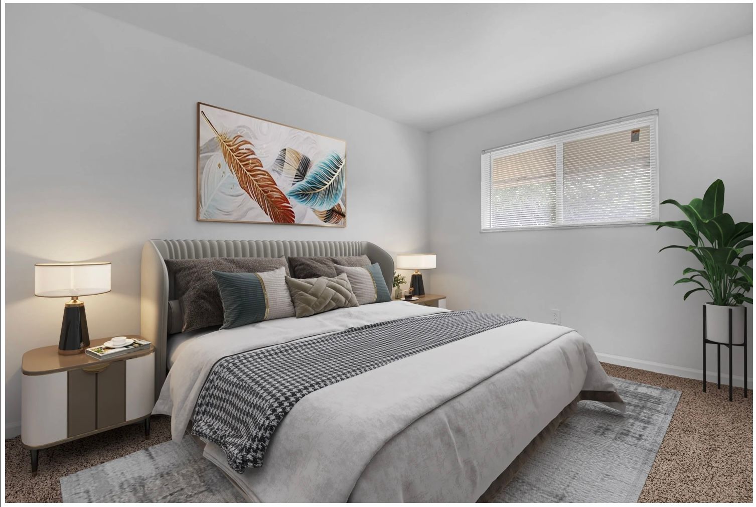 Bright bedroom with a neatly made bed, bedside lamps, wall art, and a large plant by the window