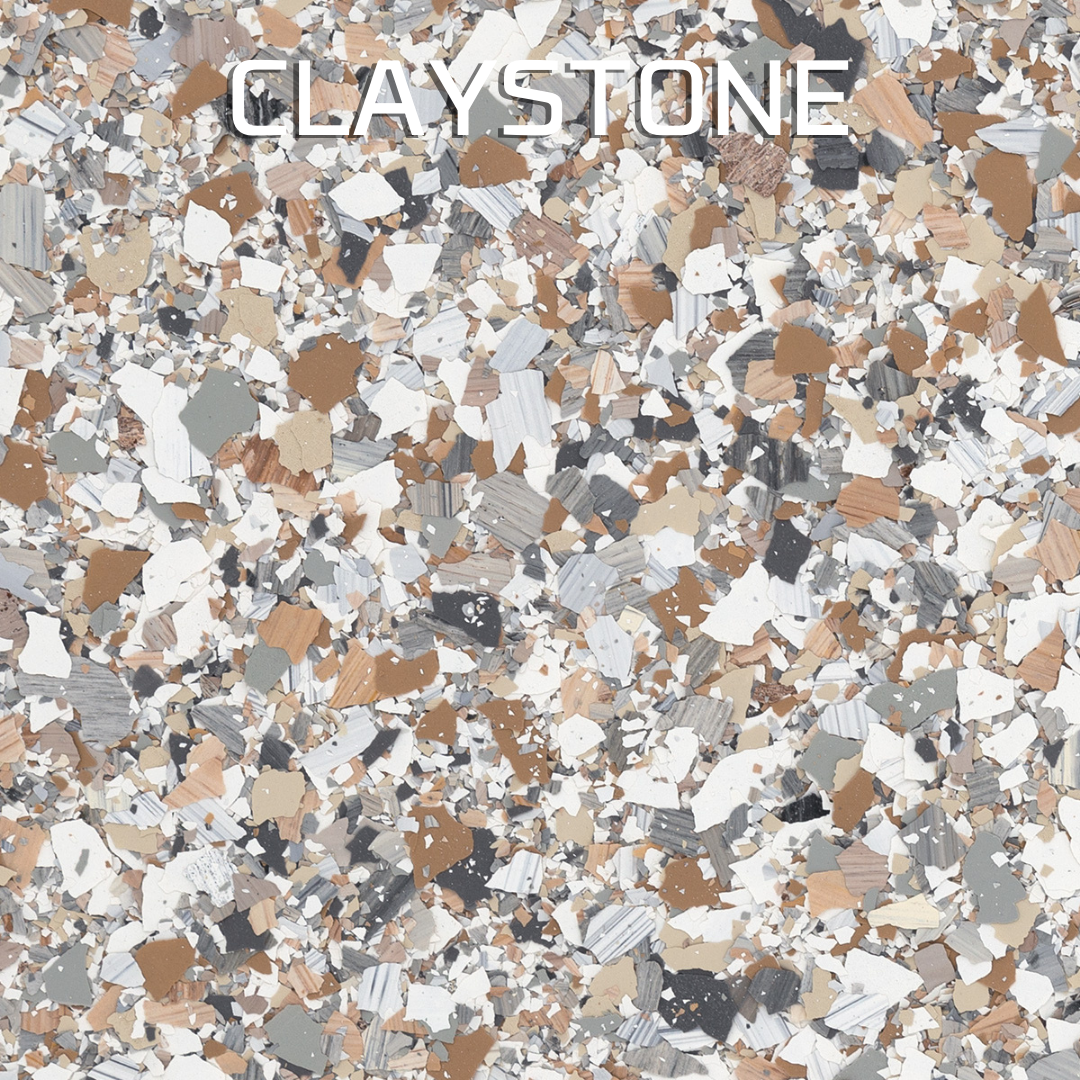 Claystone sample with speckled tan, white, gray, and black chips, labeled “CLAYSTONE” at the top.