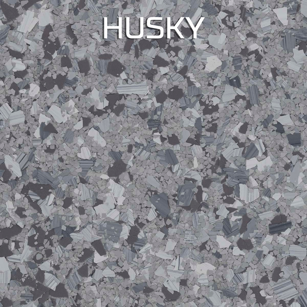 HUSKY text over a gray speckled camouflage pattern