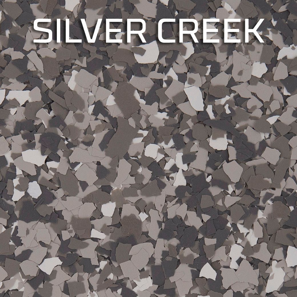 “SILVER CREEK” text over a gray camouflage-pattern background.