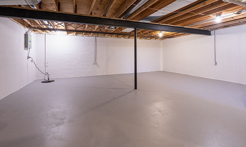 finished basement with poly floor coating