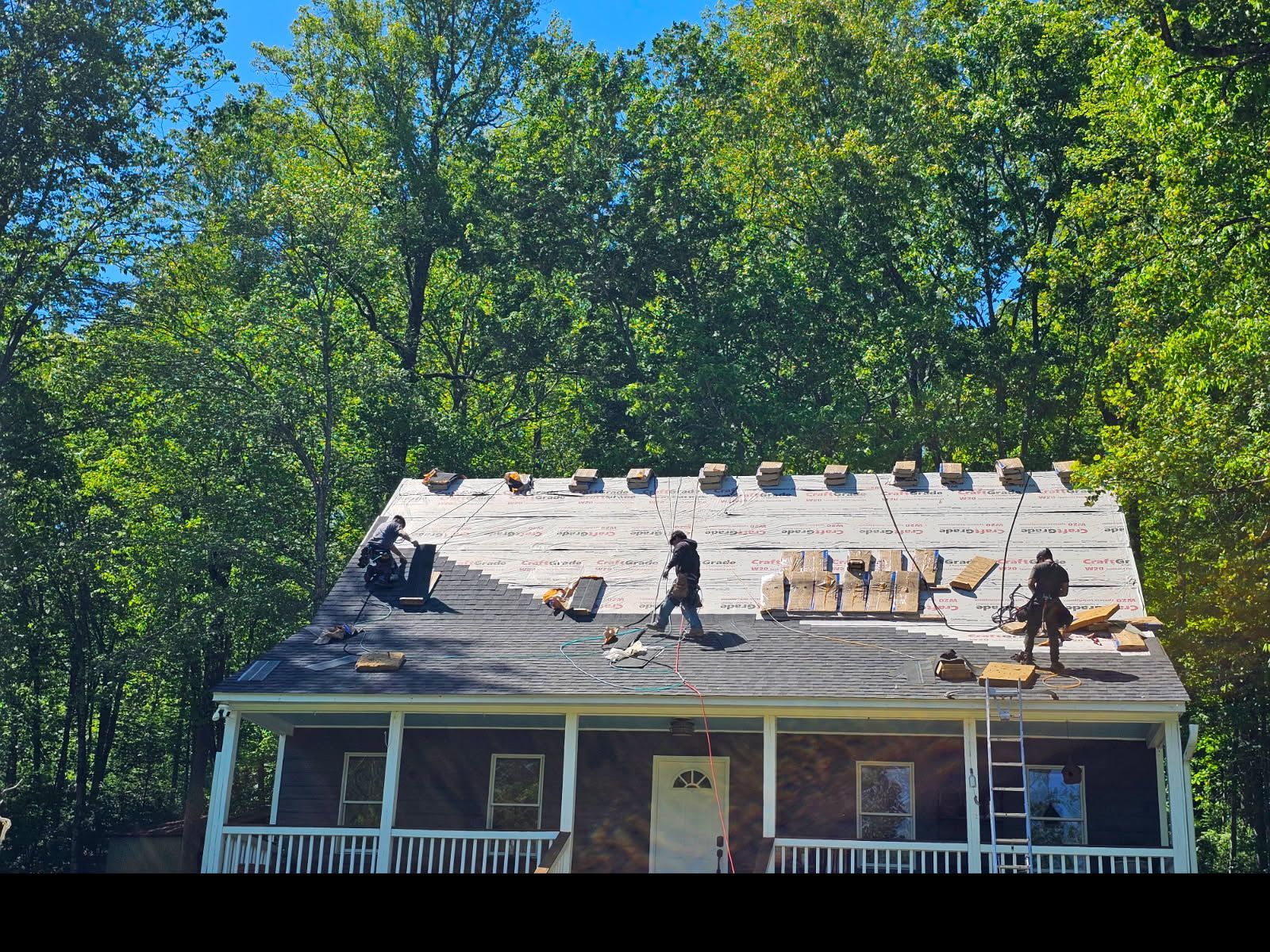 Roofing repair by D & B Roofing Services underway
