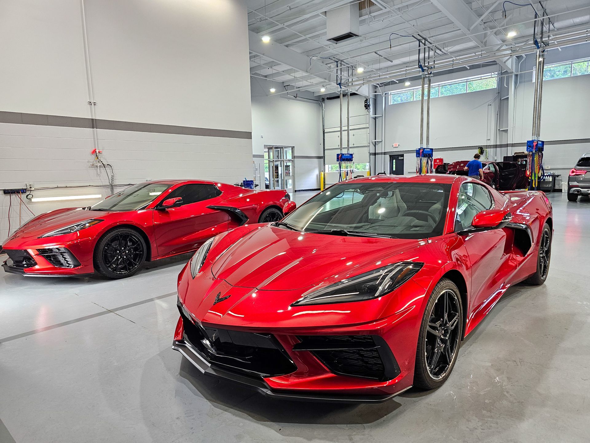 Vehicle receiving a ceramic coating application in preparation for winter, showcasing glossy paint and protection against road salt and environmental damage.