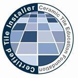 Circular logo with a blue and white tiled floor graphic, text reads