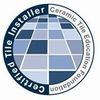 Circular logo with a blue and white tiled floor graphic, text reads