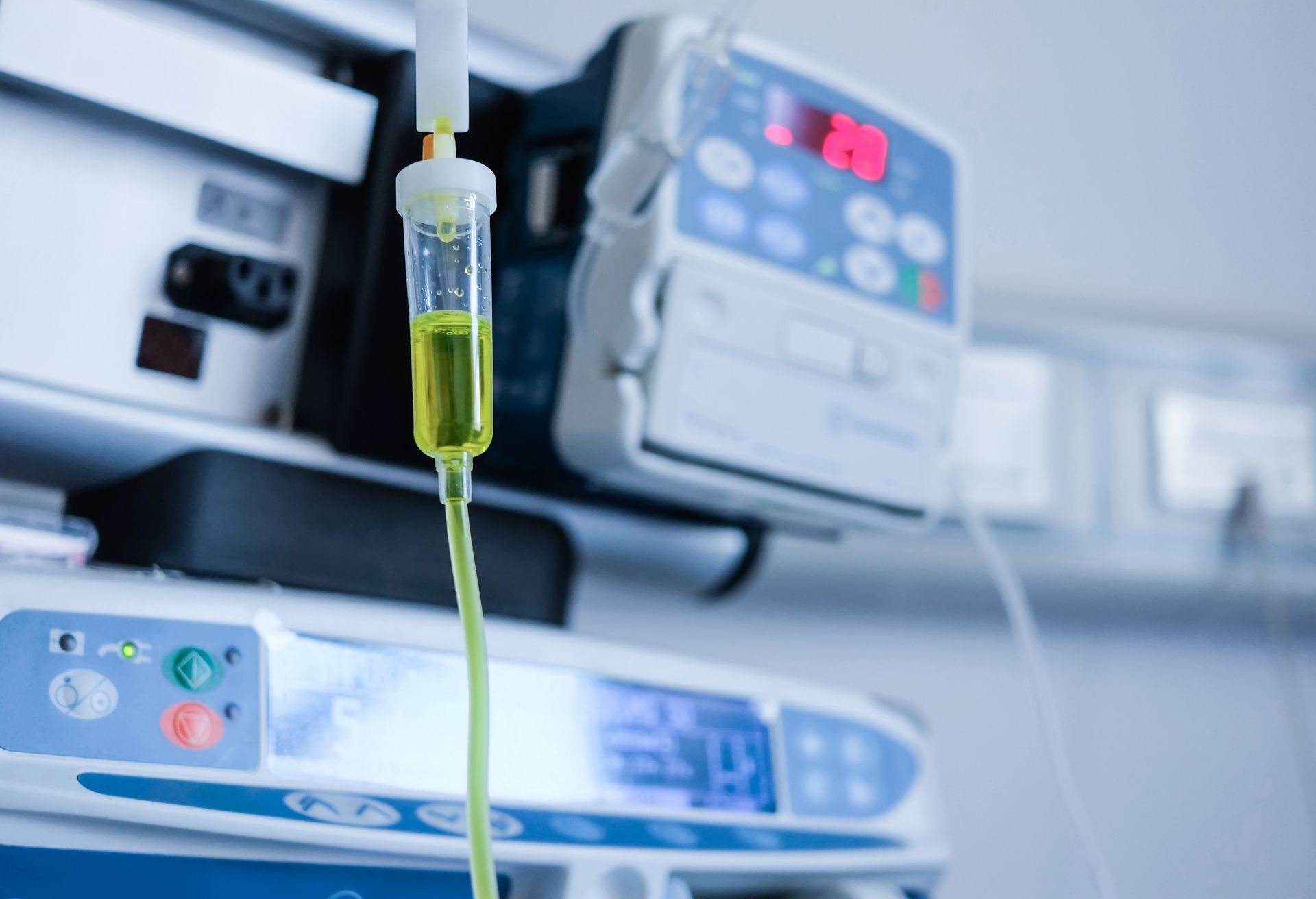 a close up of an infusion pump in a hospital room .