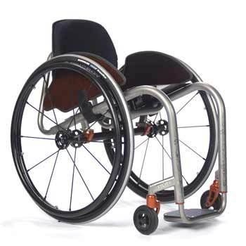 A close up of a wheelchair on a white background.