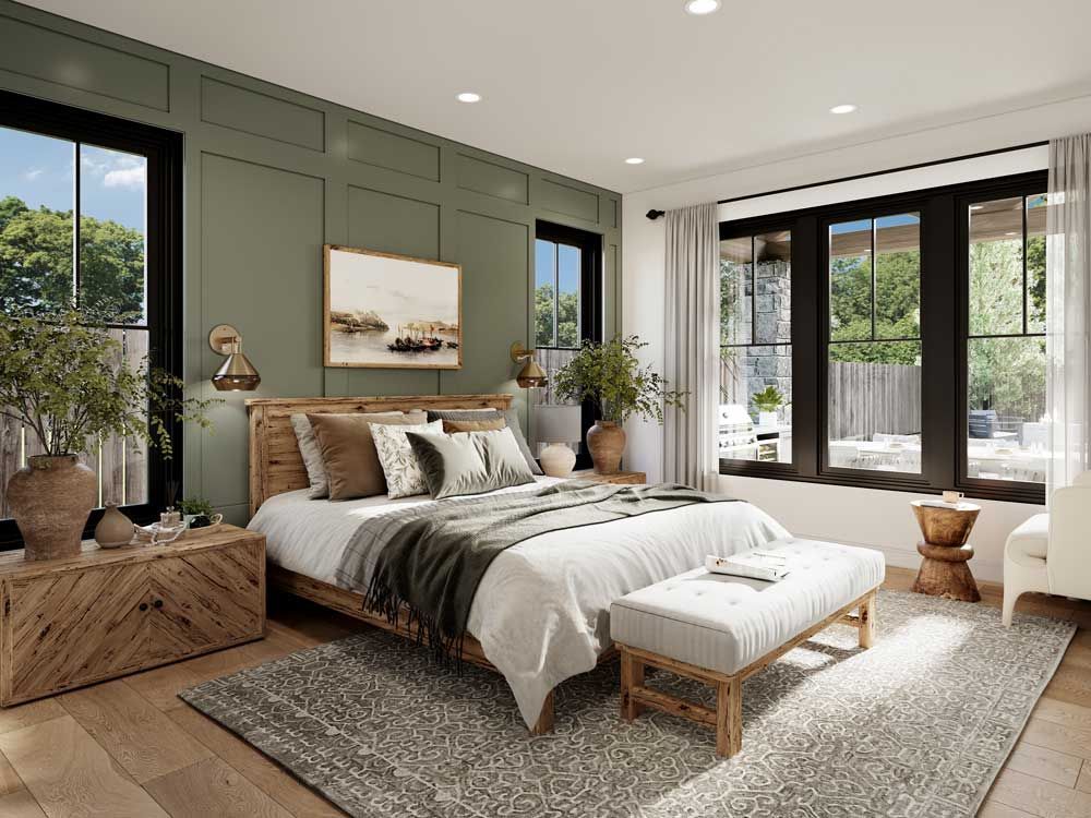 Bright modern bedroom with green paneled walls, large windows, a bed, bench, and woven accents