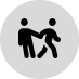Two people walking together, one supporting the other.